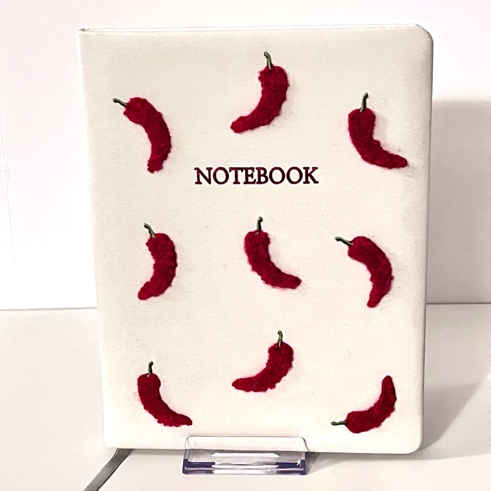 White Notebook with Red Chili Peppers